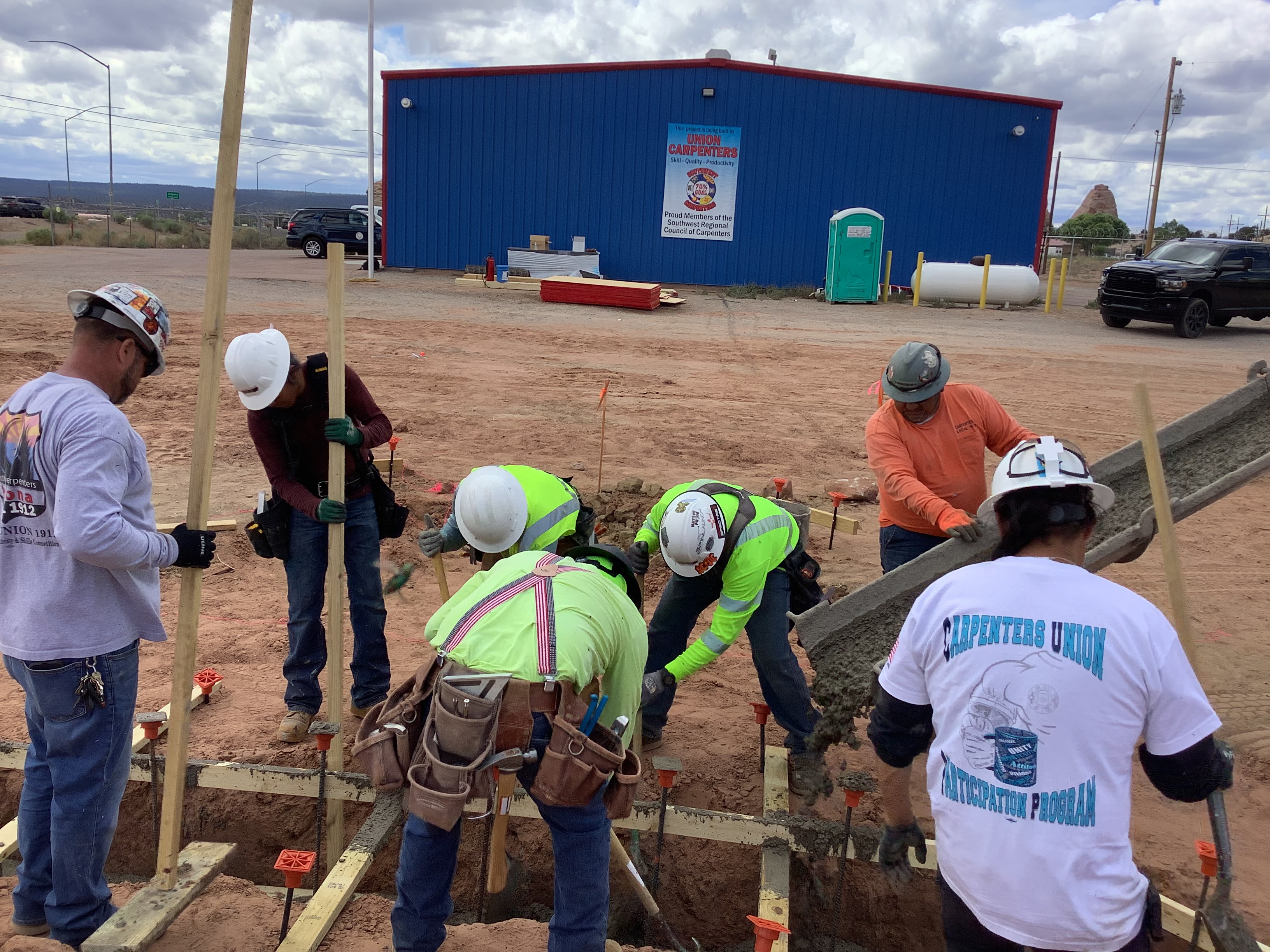 Carpenters constructing footings Carpenters construct footings for concrete foundations.